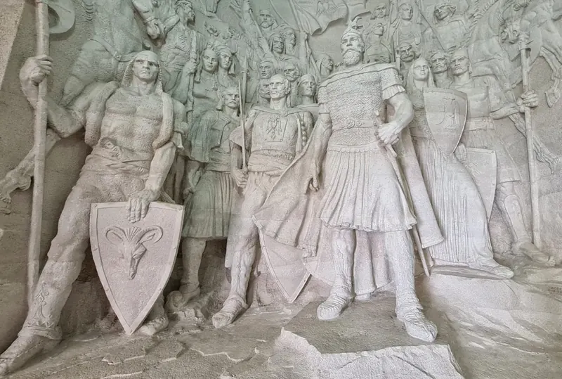 Stone relief of Skanderbeg and his warriors in Krujë